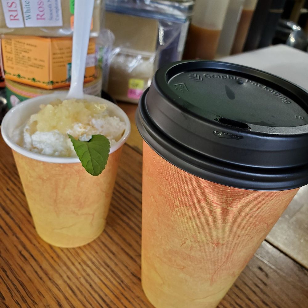 two cups of coffee on a table two cups of coffee on a table