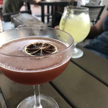 The Third Door - Mezcal mango drink in front. Drink with thyme in back. Both great. - Speakeasies Near Me - Marietta, Georgia