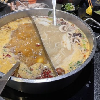 Happy Lamb Hot Pot - Split hot pot (spicy on the left) - Mongolian Near Me - Edison, New Jersey