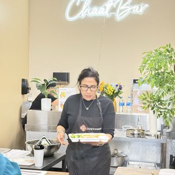 Punjab Sweets Market - Our instructor, Harpreet serving us. - Indian Near Me - Kent, Washington