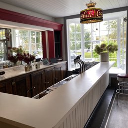 a bar with a large window a bar with a large window