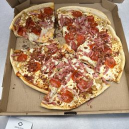 All Meats Pizza Thrown In a Box