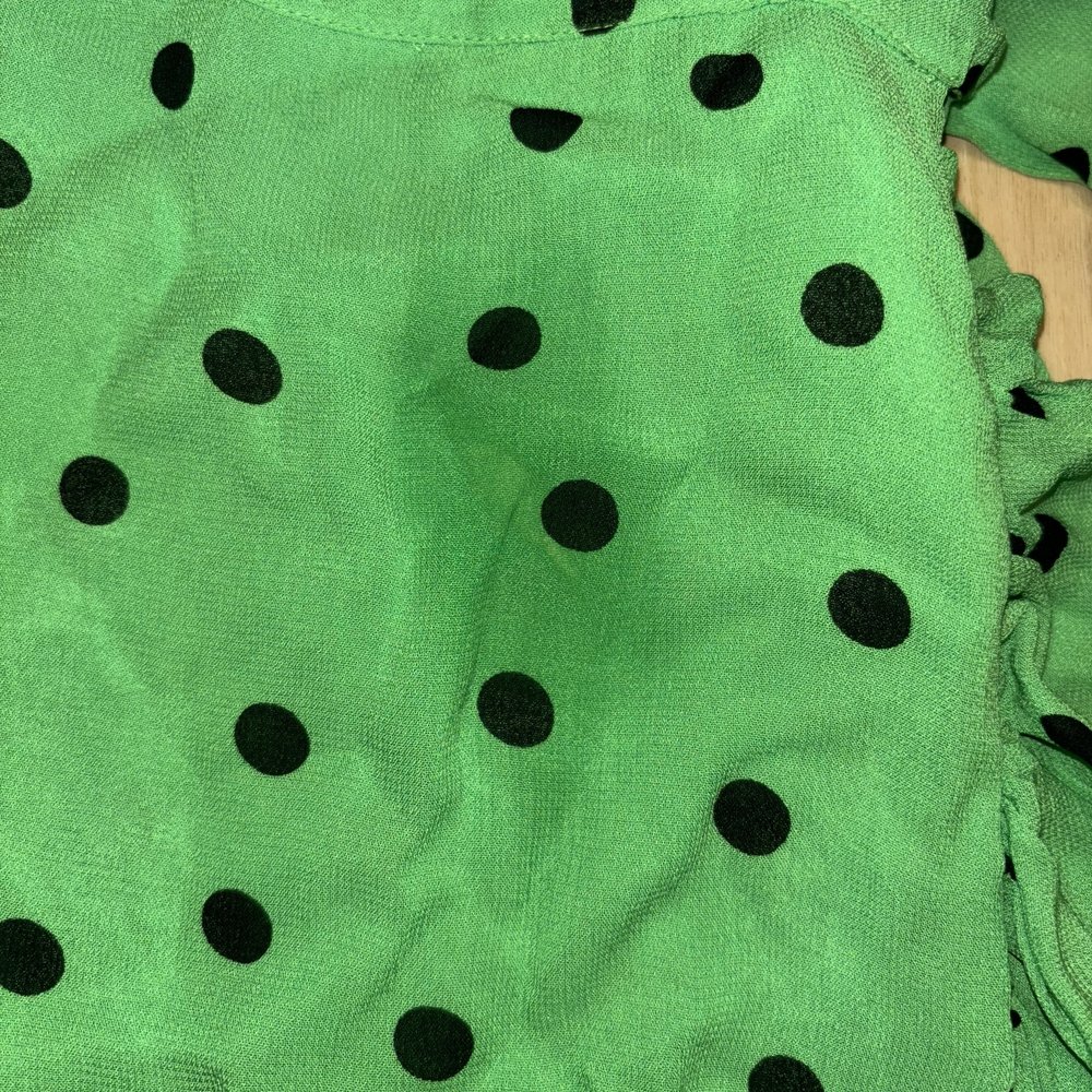 Stain in skirt labeled "excellent condition" Stain in skirt labeled "excellent condition"