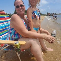 Windward Beach - Me and my granddaughter hanging out with our feet in the water