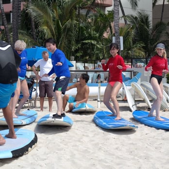Faith Surf School - 15 minutes of prep on the sand with instructor (the guy with the tan legs!) - Surf Schools Near Me - Honolulu, Hawaii Faith Surf School - 15 minutes of prep on the sand with instructor (the guy with the tan legs!) - Surf Schools Near Me - Honolulu, Hawaii