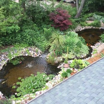 Lake Street Commons Lodging - View of koi pond from balcony of the one bedroom apartment - Vacation Rentals Near Me - Saugatuck, Michigan