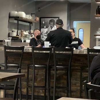 Zio Peppe - At one time, up to six employees gather to chat while we waited for our food. I am pretty sure one of them was the lone chef. - Pizza Near Me - Tucson, Arizona Zio Peppe - At one time, up to six employees gather to chat while we waited for our food. I am pretty sure one of them was the lone chef. - Pizza Near Me - Tucson, Arizona