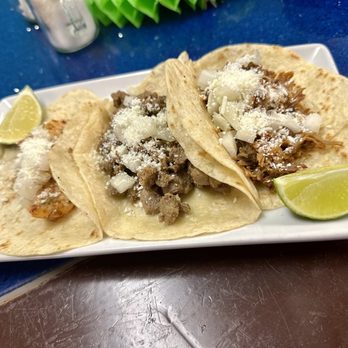 Taco Fiesta - Shrimp taco, steak taco, carnitas taco (left to right) - Mexican Near Me - Mulberry, Florida Taco Fiesta - Shrimp taco, steak taco, carnitas taco (left to right) - Mexican Near Me - Mulberry, Florida
