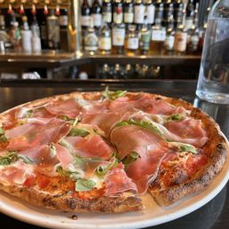 Prosciutto & organic arugula pizza Prosciutto & organic arugula pizza