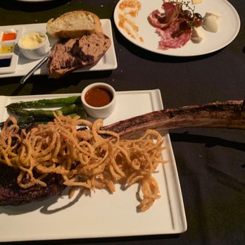 Bien Shur - Tomahawk ribeye and complimentary bread dish. Also picked over and mostly eaten charcuterie board. - New American Near Me - Albuquerque, New Mexico Bien Shur - Tomahawk ribeye and complimentary bread dish. Also picked over and mostly eaten charcuterie board. - New American Near Me - Albuquerque, New Mexico