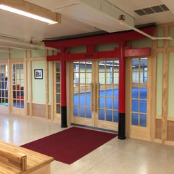 Tiger's Claw Martial Arts - Dojo entrance with Tiger Claw archway.