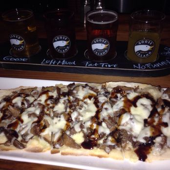Bin228 Gastropub - Duck Confit flatbread with beer sampler - New American Near Me - Glastonbury, Connecticut Bin228 Gastropub - Duck Confit flatbread with beer sampler - New American Near Me - Glastonbury, Connecticut