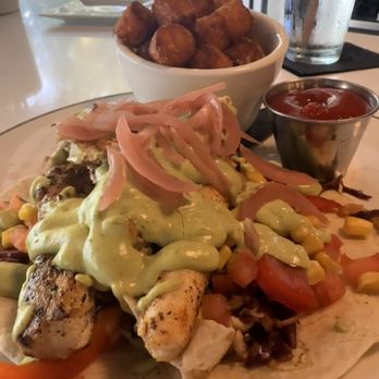 Rusteak - Mahi Tacos and Sweet Potato Tots. Amazing. - New American Near Me - Orlando, Florida