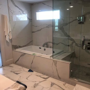 Luis Cruz Flooring - DFW - Floor, walls, tub and shower surround (heated floor). - Flooring Near Me