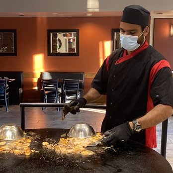 Sizzle Mongolian Grill - a man wearing a face mask - Mongolian Near Me - Sudbury, Ontario Sizzle Mongolian Grill - a man wearing a face mask - Mongolian Near Me - Sudbury, Ontario