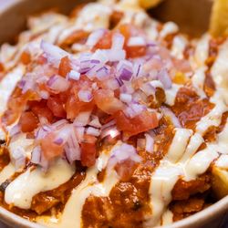 Poutine Hub - Butter Chicken Poutine (small $7.99)