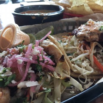 Torchy's Tacos - Baja taco on the left, mr pink taco on the right - Tex-Mex Near Me - Houston, Texas Torchy's Tacos - Baja taco on the left, mr pink taco on the right - Tex-Mex Near Me - Houston, Texas