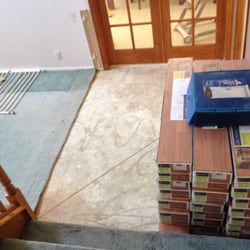 Art Zamora Tile - First day demo in our dinning room. Goodbye 28 year old carpet!