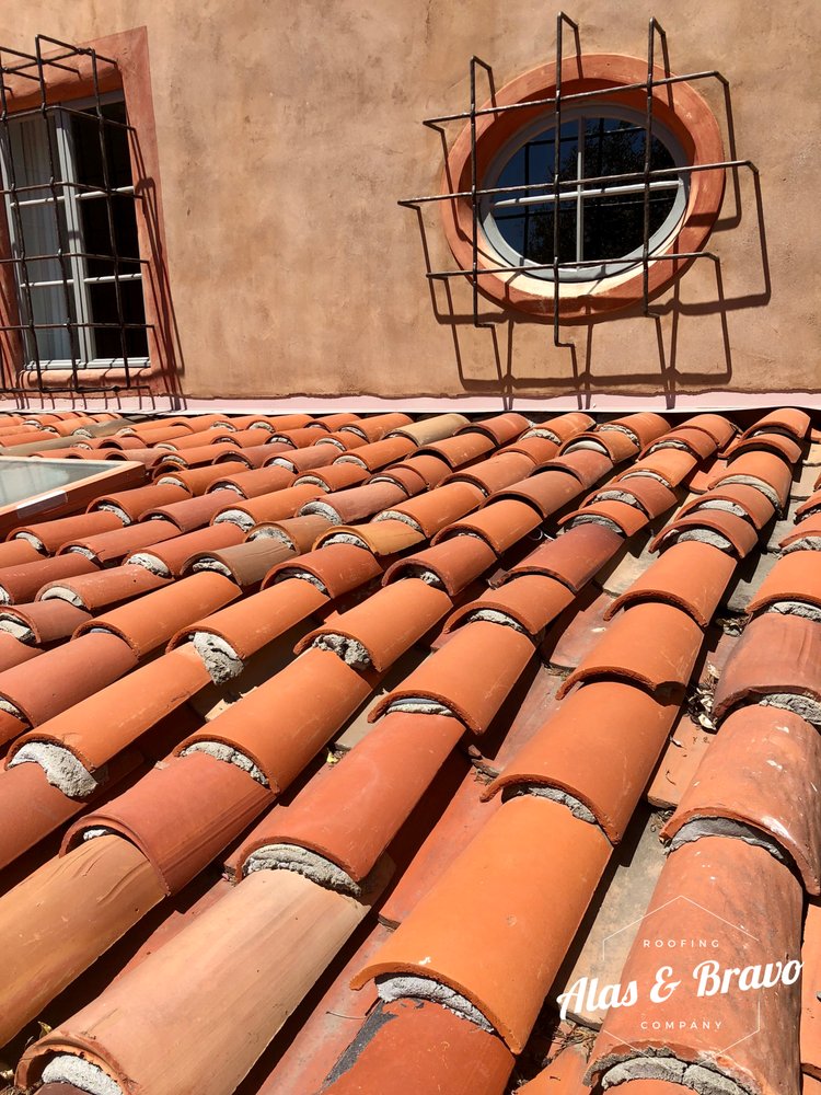 Slide of Alas & Bravo Roofing Company