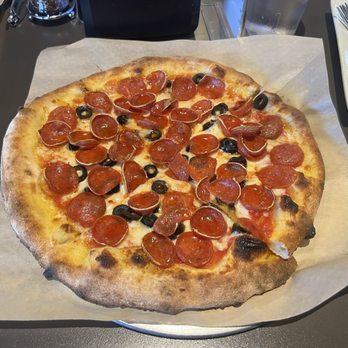 Cascadia Pizza Restaurant & Brewery - Pepperoni pizza with black olives added. - Pizza Near Me - Bellevue, Washington Cascadia Pizza Restaurant & Brewery - Pepperoni pizza with black olives added. - Pizza Near Me - Bellevue, Washington