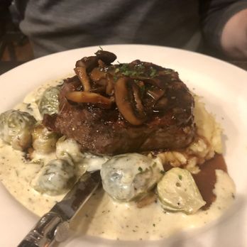 The Grand Cafe - Ribeye. Cooked to correct temperature. The veggies were a bit too heavy with the cream as you can see - New American Near Me - Jefferson City, Missouri