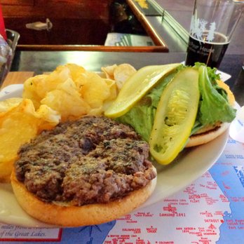 Dick's Pour House - Charburger, medium with a pint of Widowmaker.  Only regret is forgetting to buy the pint glass! - Burgers Near Me - Lake Leelanau, Michigan
