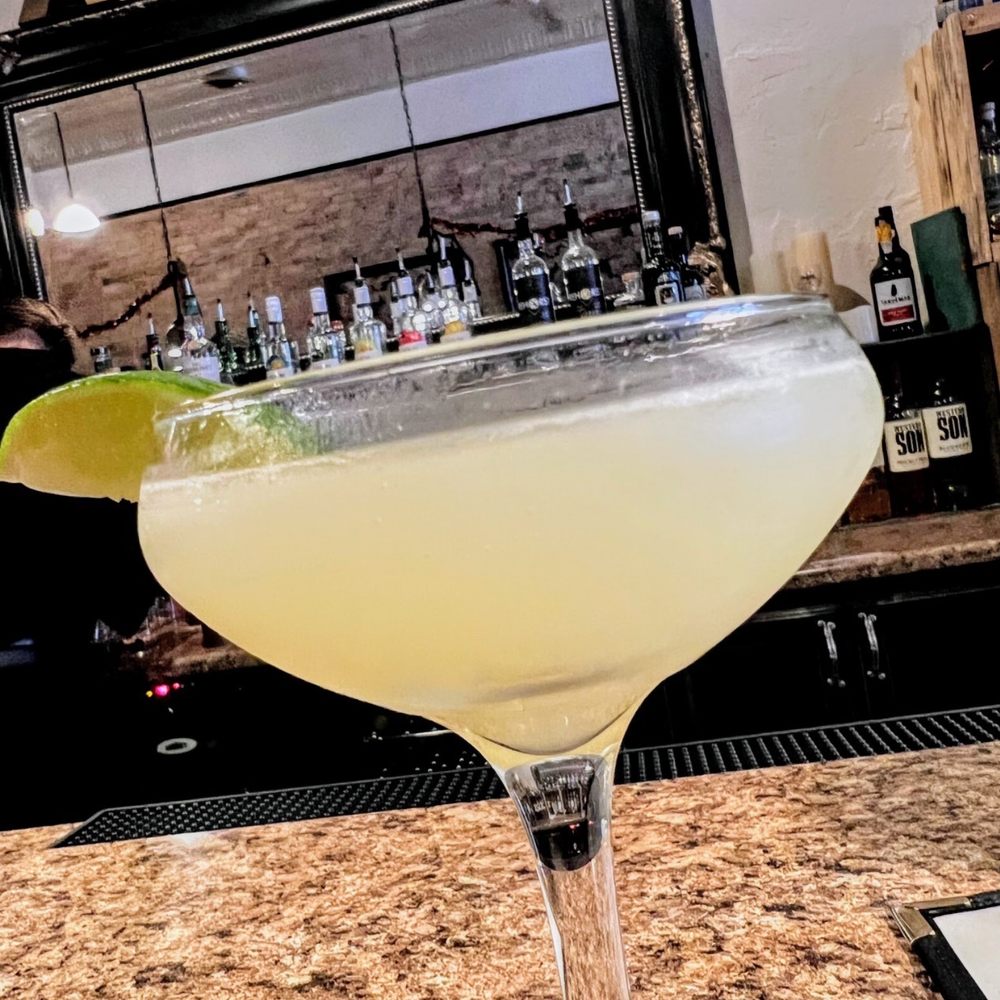 Author's Kitchen + Bar - a margarita in a martini glass - Bars Near Me - Appleton, Wisconsin