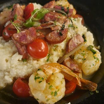 Lucille's - Shrimp and grits in some sort of broth gravy. Our least favorite - New American Near Me - Houston, Texas