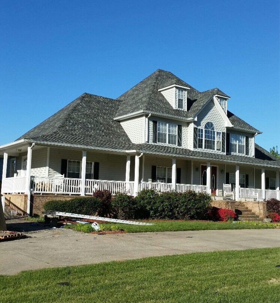 Slide of Team Roofing and Construction