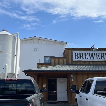 Glacier Brewing Company - truck parked in front of building - Breweries Near Me - Polson, Montana Glacier Brewing Company - truck parked in front of building - Breweries Near Me - Polson, Montana