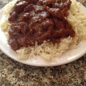 Ali Baba - Half order of Friday special, chicken walnut pomegranate over basmati rice - Middle Eastern Near Me - Davis, California