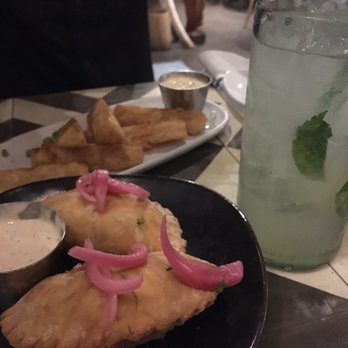 Ceviche's - Empanadas and yuca frita. but el panameño doesnt put white sauce on their stuff.... good ... not panamanian. loved the mojito over all. - Seafood Near Me - Wilmington, North Carolina