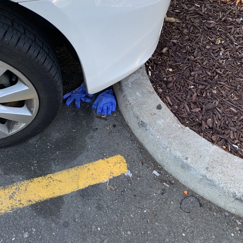 Walmart Supercenter - Used gloves all over the parking lot. 3/31/2020 - Department Stores Near Me - Tracy, California