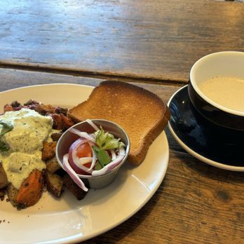 Tatte Bakery & Cafe | Pier 4 - Lamb hash with GF bread and latte - Coffee & Tea Near Me - Boston, Massachusetts Tatte Bakery & Cafe | Pier 4 - Lamb hash with GF bread and latte - Coffee & Tea Near Me - Boston, Massachusetts