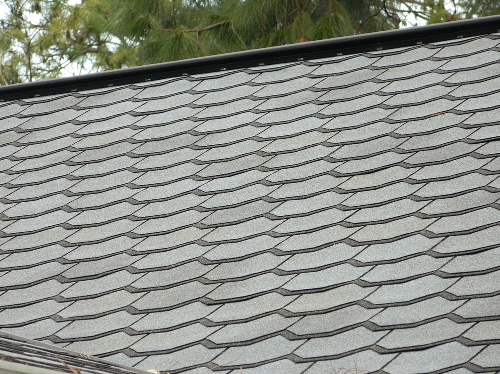 Slide of Hinspeter Roofing