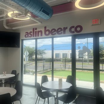 Aslin Beer - View to outside deck and seating. - Breweries Near Me - Virginia Beach, Virginia Aslin Beer - View to outside deck and seating. - Breweries Near Me - Virginia Beach, Virginia
