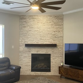 Flooring Warehouse - Flooring warehouse installed wood floors and stone for fireplace feature wall. - Flooring Near Me - Austin, Texas Flooring Warehouse - Flooring warehouse installed wood floors and stone for fireplace feature wall. - Flooring Near Me - Austin, Texas