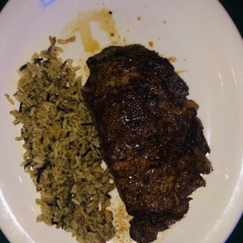 Austin's Cattle - 12oz Delmonico steak with rice - New American Near Me - Valdosta, Georgia Austin's Cattle - 12oz Delmonico steak with rice - New American Near Me - Valdosta, Georgia