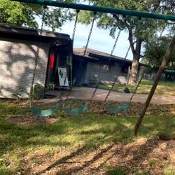 Cure Lice - Tree swings, monkey bars, &hoola hooping opportunities for kids to get their wiggles out while waiting for their sibling to finish treatment