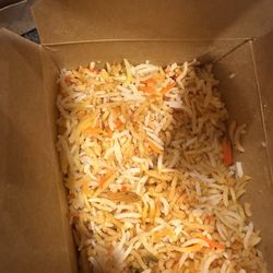 The rice that came with the dishes. Full of flavor! Delicious on its own!