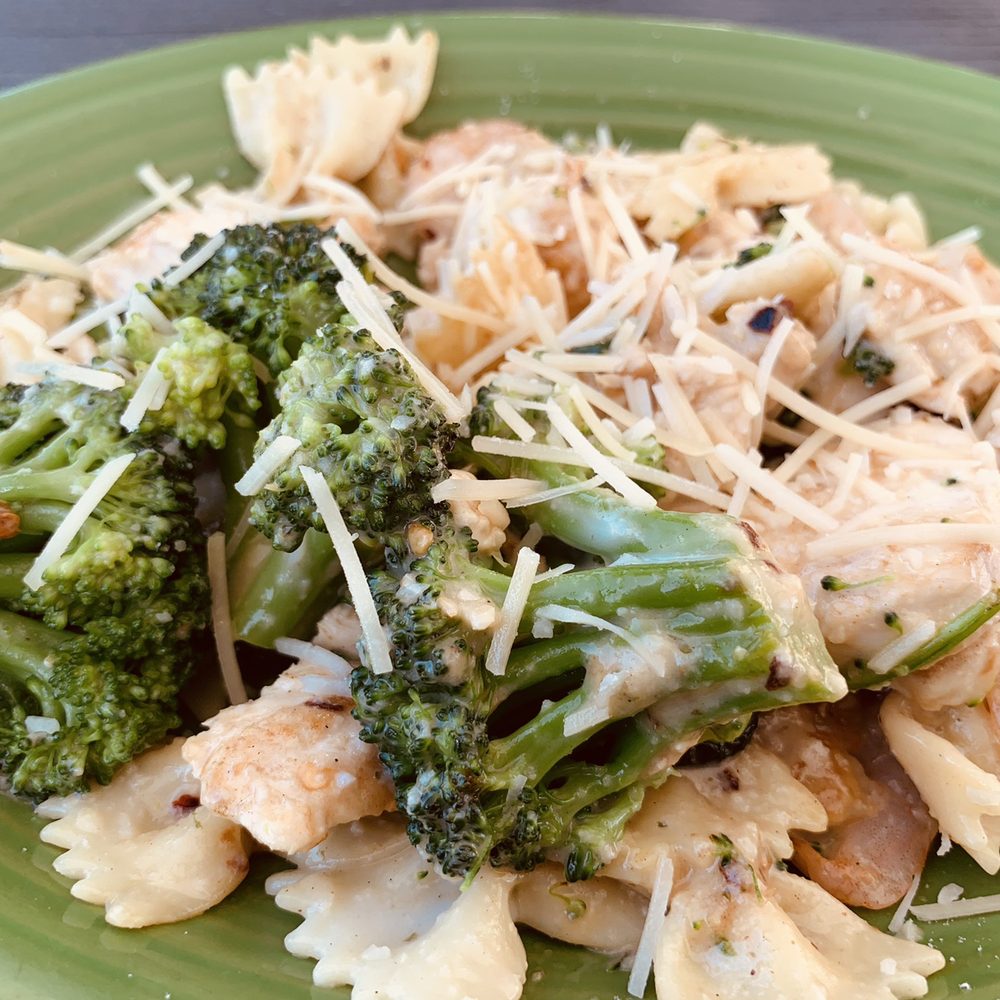 Fire + Ice - Chicken & Shrimp Alfredo with broccoli and farfalle pasta topped with Parmesan Cheese - New American Near Me - Anaheim, California Fire + Ice - Chicken & Shrimp Alfredo with broccoli and farfalle pasta topped with Parmesan Cheese - New American Near Me - Anaheim, California