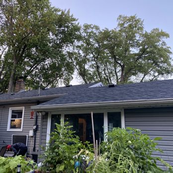 Elysian Construction - the roof of a house with a gray shingled roof - General Contractors Near Me - Minneapolis, Minnesota