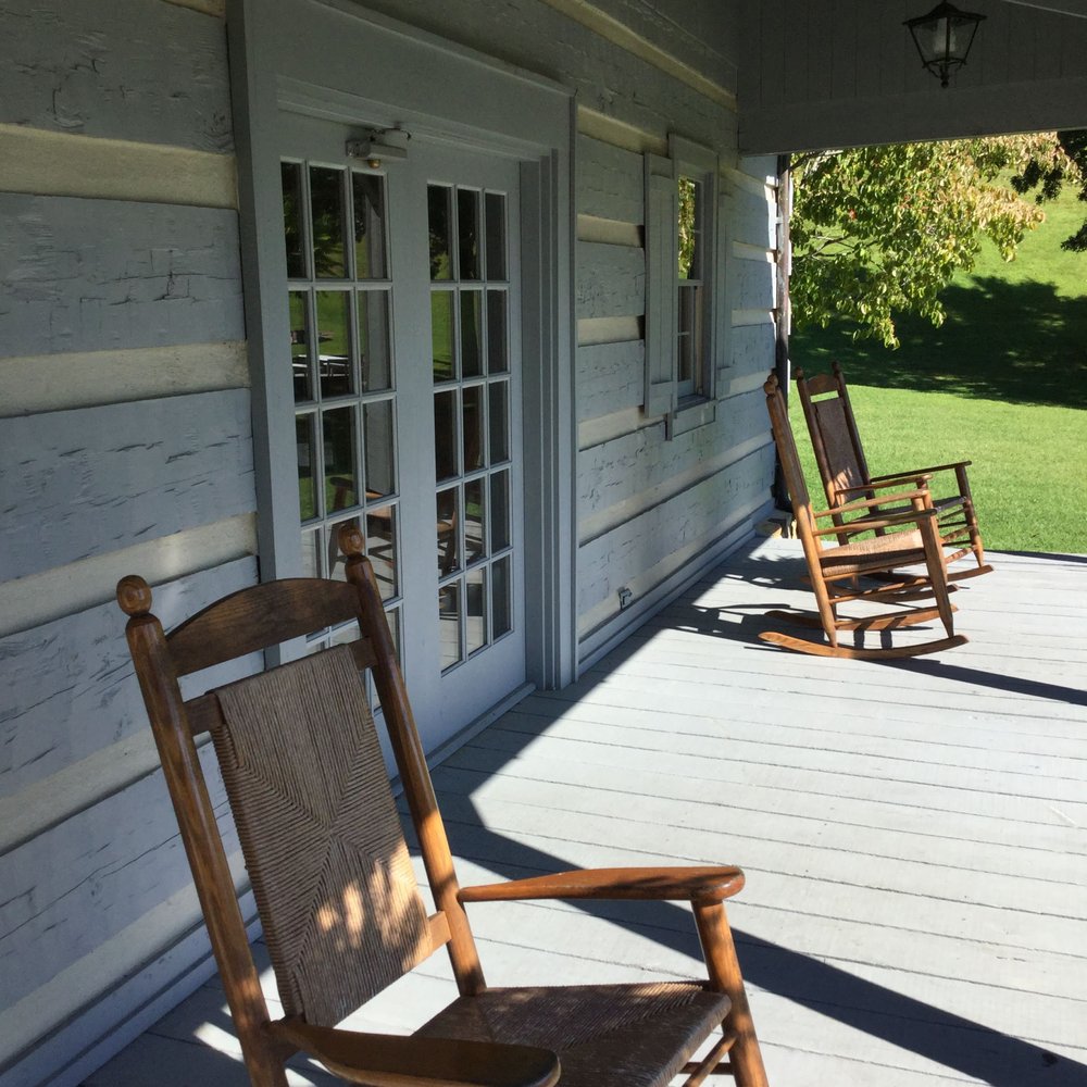 Tennessee Welcome Center - The porch in which I was standing to take the panoramic view... Such a cozy little spot!! :) - Rest Stops Near Me - Hartford, Tennessee