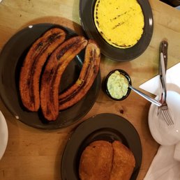 Arepa, plantains, guacamole, and empanadas Arepa, plantains, guacamole, and empanadas