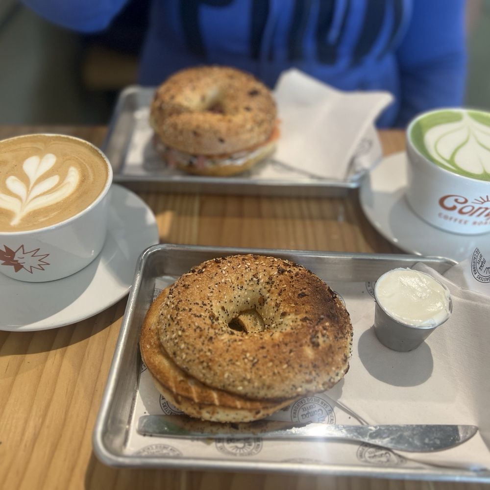 Compa Coffee Roasters - Cafe latte everything bagel with cream cheese. Matcha latte and salmon cheese everything bagel. - Coffee Roasteries Near Me - San Diego, California Compa Coffee Roasters - Cafe latte everything bagel with cream cheese. Matcha latte and salmon cheese everything bagel. - Coffee Roasteries Near Me - San Diego, California
