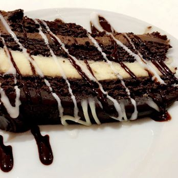 Fogo de Chão - tinyyyy sliver of chocolate cake... where was the huge slices we were seeing at other tables?! - Brazilian Near Me - Chicago, Illinois Fogo de Chão - tinyyyy sliver of chocolate cake... where was the huge slices we were seeing at other tables?! - Brazilian Near Me - Chicago, Illinois