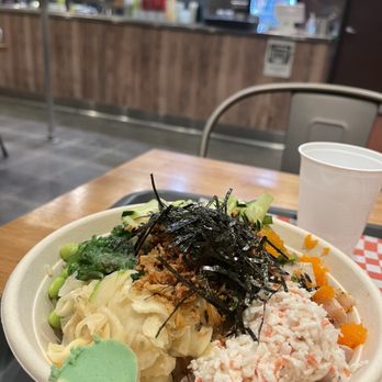 Poke Tiki - a bowl of food on a table - Seafood Near Me - Orange, California Poke Tiki - a bowl of food on a table - Seafood Near Me - Orange, California