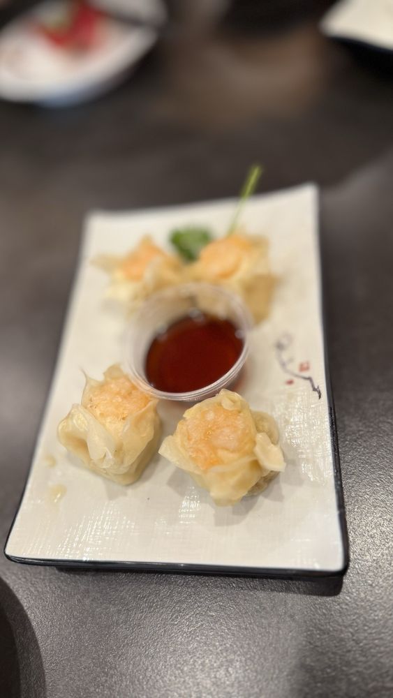 Ming’s Revolving Sushi & Bar Ming’s Revolving Sushi & Bar