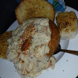 Lakeside Hideaway - Clam chowder in sourdough bowl with garlic bread! Sooo much better than we had in San Francisco, not joking