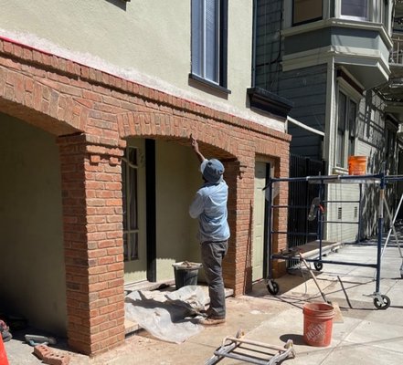 brick replacement San Francisco - this home built in 1901 had brick arches and section of brick loose.  the city gave the home owner a fine and ordered him to fix. the home had been in his family for generations and he wanted something the complemented the original brick work with a modern style brick. I pulled permits, and handed all inspections from beginning to end. customer was happy that I was able to match the original design he was accustomed to seeing since a child